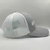 Gorra Columbia Gris Claro Letra Blanca